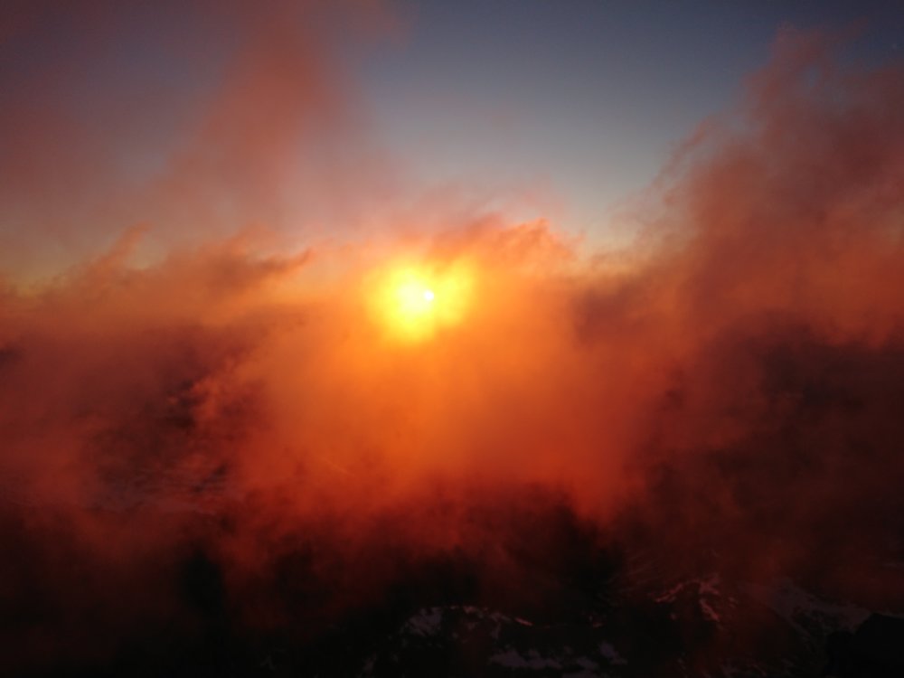  Sun shining through the clouds 