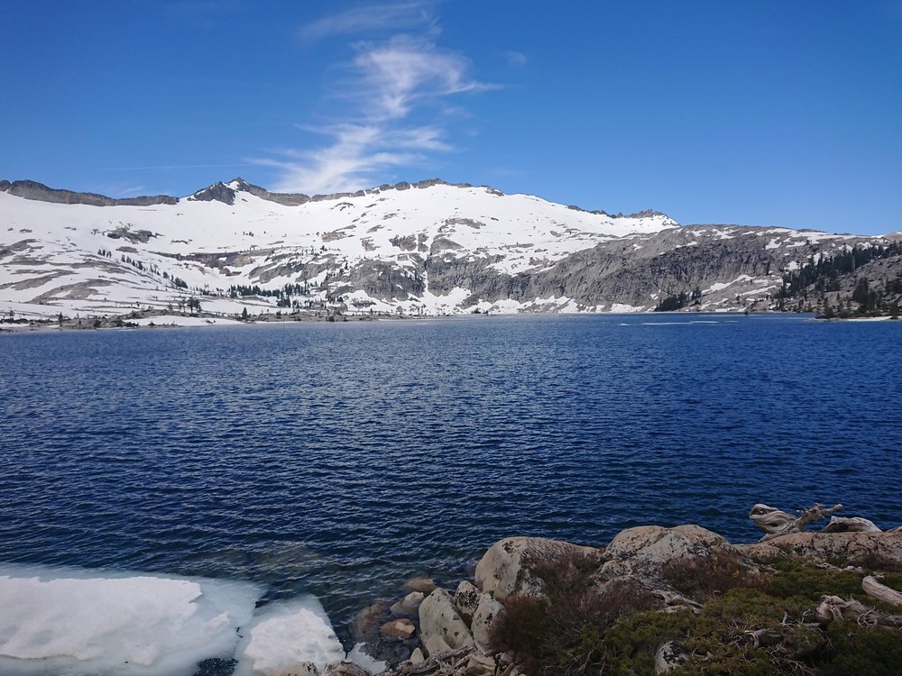  Lake Aloha is beautiful with the snow covered mountains as a backdrop 