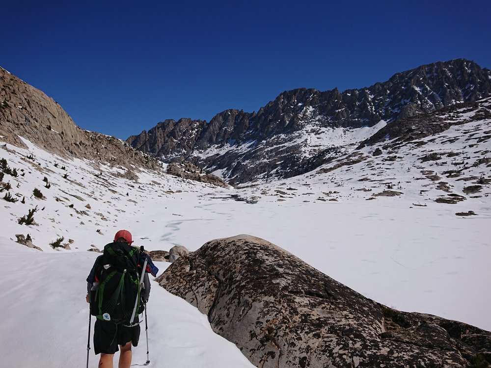  During the descent we were constantly surrounded by amazing mountains and passed numerous snow covered lakes 