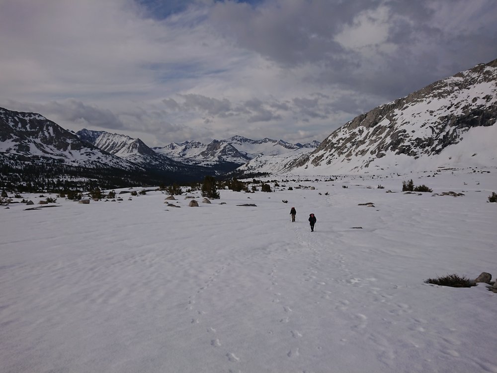  Looking back at Avocadoo and Sensei moving across the snow towards Mather Pass 