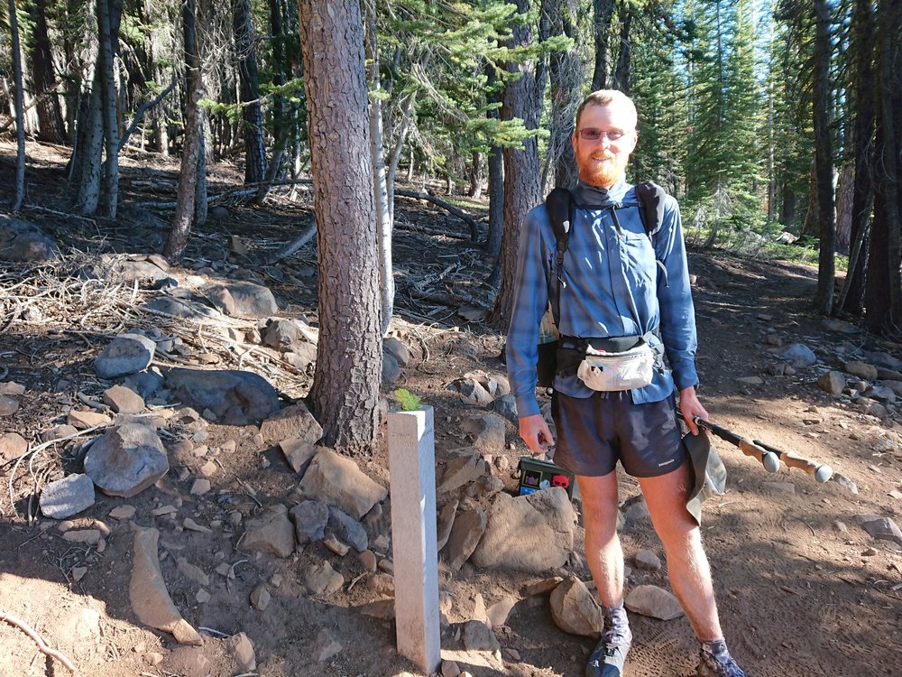  Posing in front of the midpoint post 